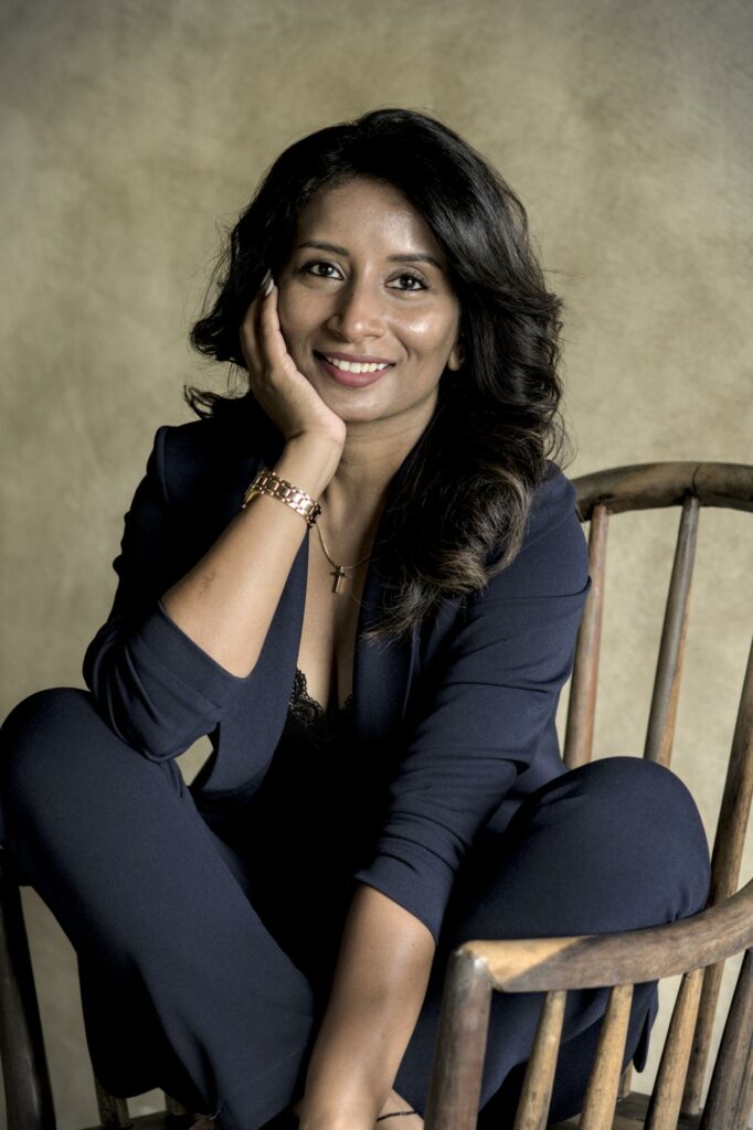 Elegant portrait of a professional woman against a textured background