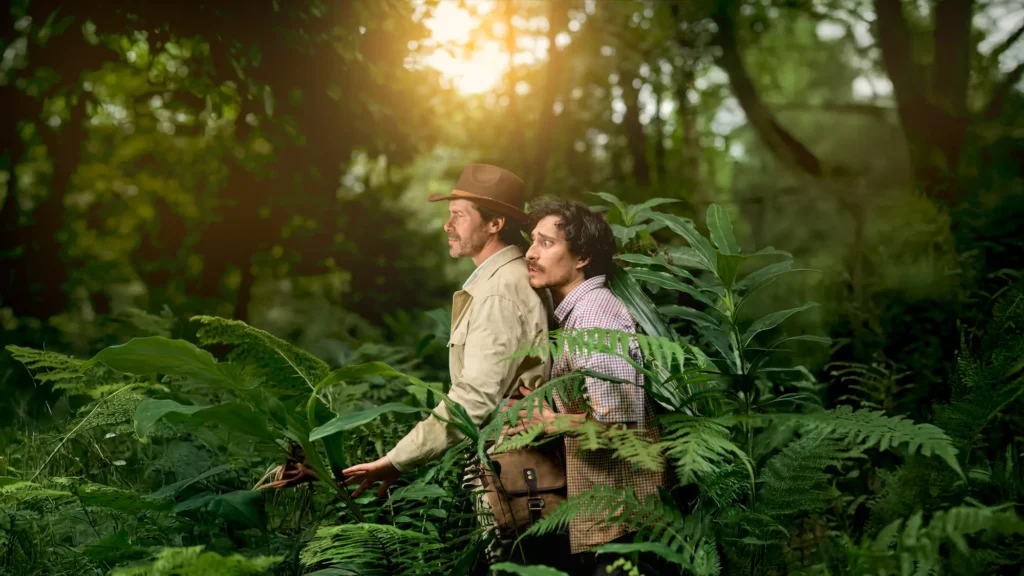 final version of the photo of the lost man being protected by the jungle guide.