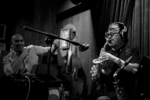 the producer has some fun while saxophonist Tran Manh Tuan plays