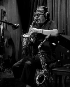 Tran Manh Tuan plays the saxophone