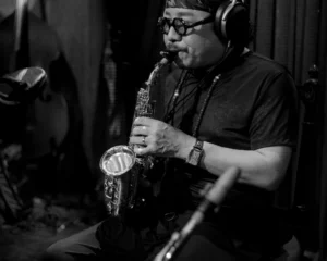 Tran Manh Tuan plays the saxophone