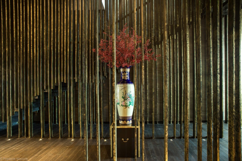 vase decor by a stairwell for LW Designs